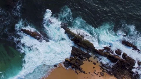 Waves roll onto the beach, srilanki, sand, spray, rocks, 4k Video stock 274150128