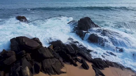 Waves roll onto the beach, srilanki, sand, spray, rocks, 4k Video stock 274150129