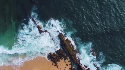 Waves roll onto the beach, srilanki, sand, spray, rocks, 4k Video stock 274150132