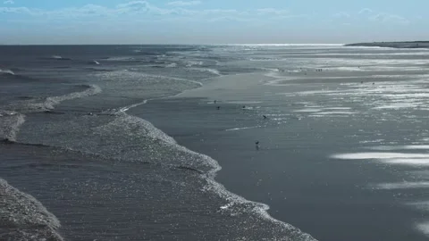 Waves roll gently toward the shore Stock Footage 346260708