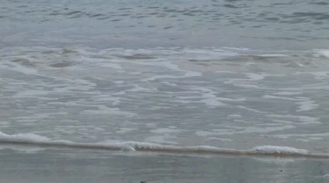 Waves roll in low shot 2 Video stock 33254189