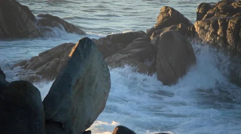 Waves Roll over Rocks at Dawn Vídeo Stock 46020532