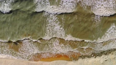 Waves roll onto shore. Stock Footage 157779274