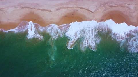 Waves roll on the shore. View from above Stock Footage 182298357