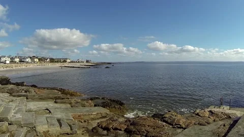 Waves roll in on sunny spring day at Blackrock beach, Ireland -2 Video stock 143114245