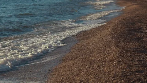 The waves rolled on a beach Video stock 77760675