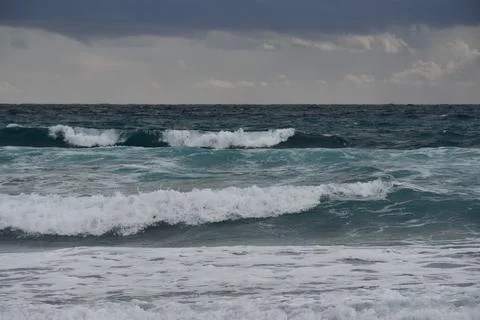 Waves Rolling Ashore in Cyprus during Storm Stock Photos
