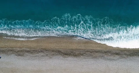 Waves Rolling Up at Beach - 4K 60fps Stock Footage 101610064