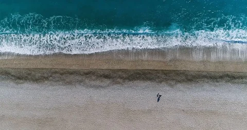 Waves Rolling Up at Beach - 4K 60fps Stock Footage 102123100