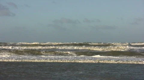 Waves rolling onto the beach Stock Footage 108290