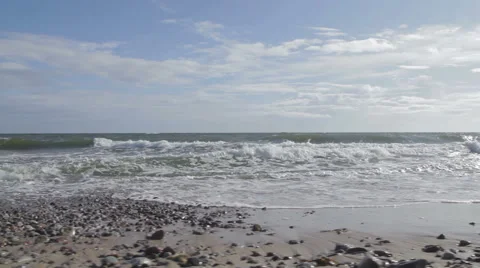 Waves rolling in to the beach Stock Footage 52727106