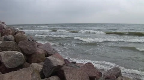 Waves rolling on a beach Stock Footage 52816406