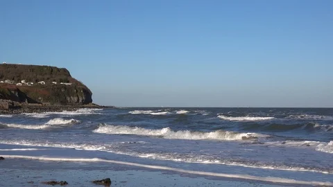 Waves rolling on to the beach Stock-Footage 86053508