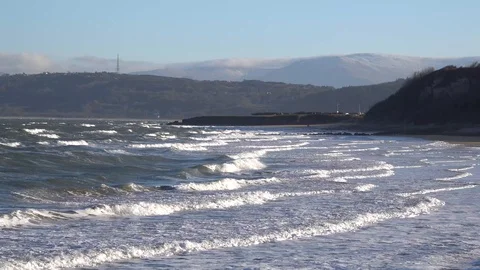Waves rolling on to the beach Stock-Footage 86053517