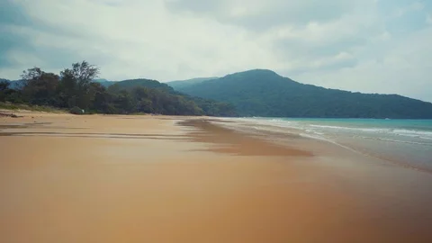 Waves rolling on to beach Stock Footage 97910798