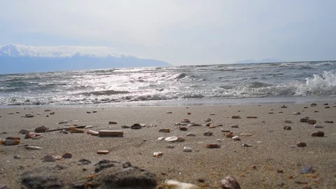 Waves rolling on a beach Video stock 120817237