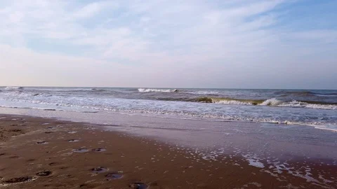 Waves rolling on beach Stock Footage 121440439