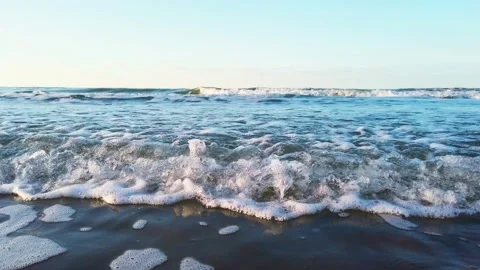 Waves rolling on the beach Stock Footage 163712179