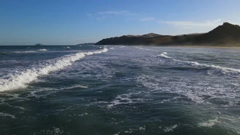 Waves Rolling onto the Beach Stock Footage 169340426