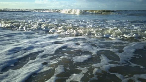 Waves rolling on the beach Stock Footage 287702397