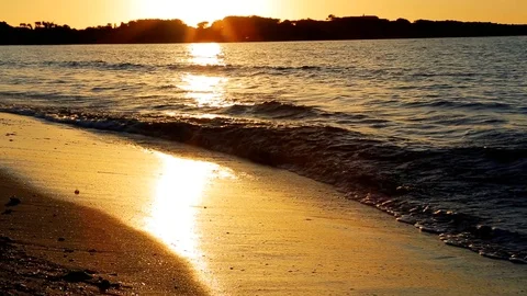 Waves Rolling in at Beach at Sunset with Tracking Camera in Sardinia 2 Stock Footage 90242970