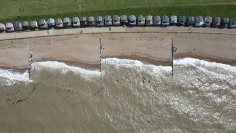 Waves rolling onto the beach at Tankerton, Kent 動画素材 241837062