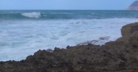 Waves Rolling in Behind Volcanic Rock in Hawaii Stock Footage 104422159