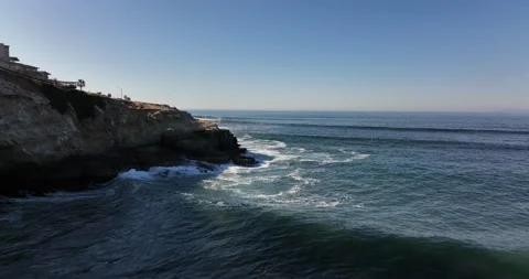 Waves Rolling into Coast 5K Stock Footage 230488347