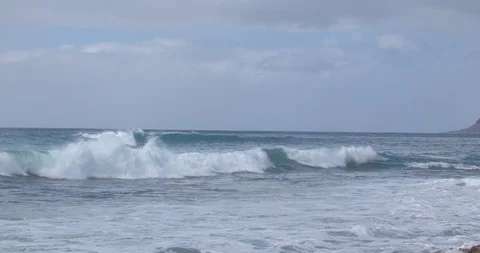 Waves Rolling in off the Coast of Oahu in Slow Motion Stock Footage 104410082