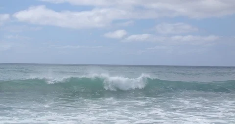 Waves Rolling in off the Coast of Oahu in Slow Motion Stock Footage 104412110