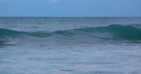 Waves Rolling off the Coast Oahu in Slow Motion Stock Footage 104420769