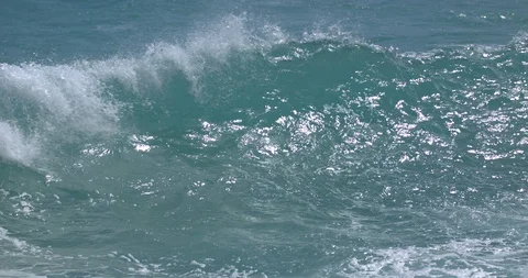 Waves Rolling off the Coast Oahu in Slow Motion Stock Footage 104443236