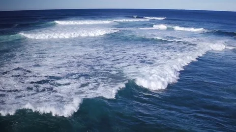 Waves rolling in Stock Footage 72610934