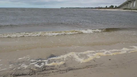 Waves rolling in on ocean bay after storms came through Stock Footage 152533337