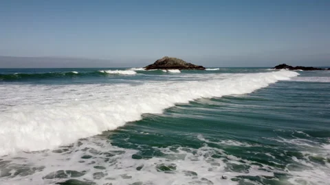 Waves rolling over the sea in Cornwall just above the surface Stock-Footage 260485964