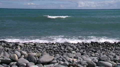 Waves rolling onto pebble beach Video stock 603749