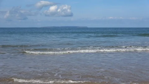 Waves Rolling in to Plemont Beach on Jersey Channel Island Stock-Footage 87697879