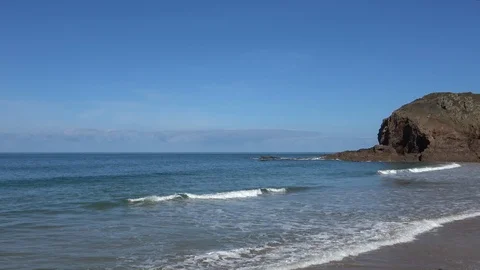 Waves Rolling in to Plemont Beach on Jersey Channel Island Stock Footage 87697930