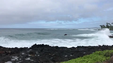 Waves rolling in off of Poipu Beach Stock Footage 144461278
