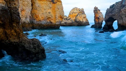 Waves rolling in, Ponta da Piedade, Algarve, Portugal Stock Footage 87038269