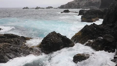 Waves rolling on a rocks Stock Footage 106624656