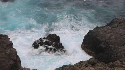Waves rolling on a rocks Stock Footage 106624727