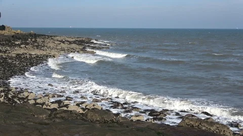 Waves rolling in to rocky bay Stock-Footage 86318507