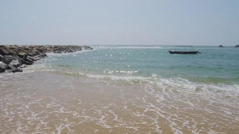 Waves Rolling Onto Sandy Beach Beside Mirissa Harbor Breakwater, Sri Lanka Stock Footage 342326296