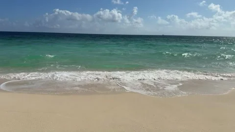 Waves Rolling onto Sandy Beach Coastline Stock Footage 347930252