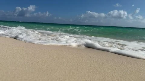 Waves Rolling onto Sandy Beach Coastline Stock Footage 347930264