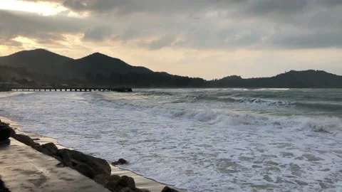 Waves rolling on a sandy beach Stock Footage 146821373