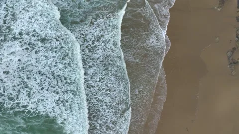 Waves Rolling On Sandy Beach In Slow Motion - Aerial Drone Stock Footage 262335834