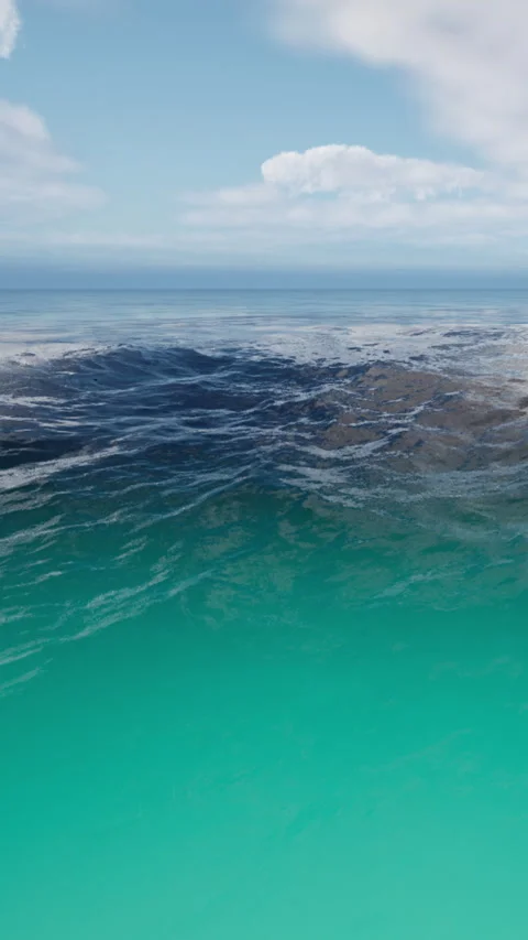 Waves rolling in at the shore with clear water and a wide sky overhead Stock Footage 341021699