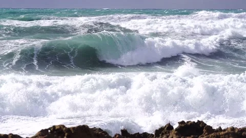 Waves rolling to shore from low perspective Stock Footage 137256637